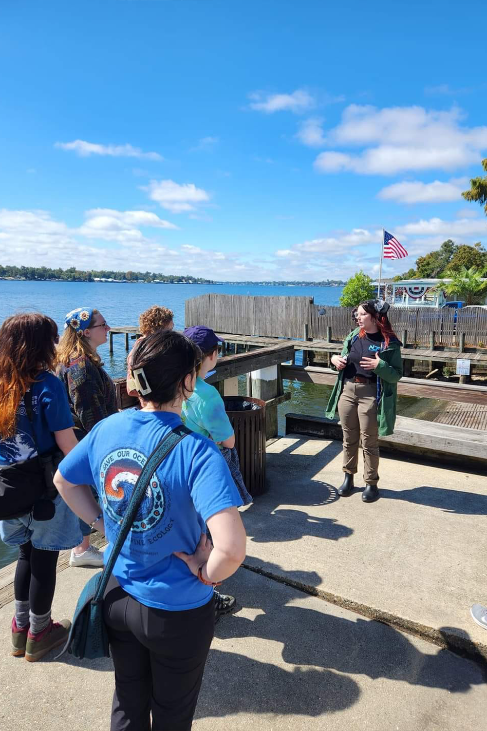 MB Armstrong (right) speaking during a coastal environments research trip in 2024.