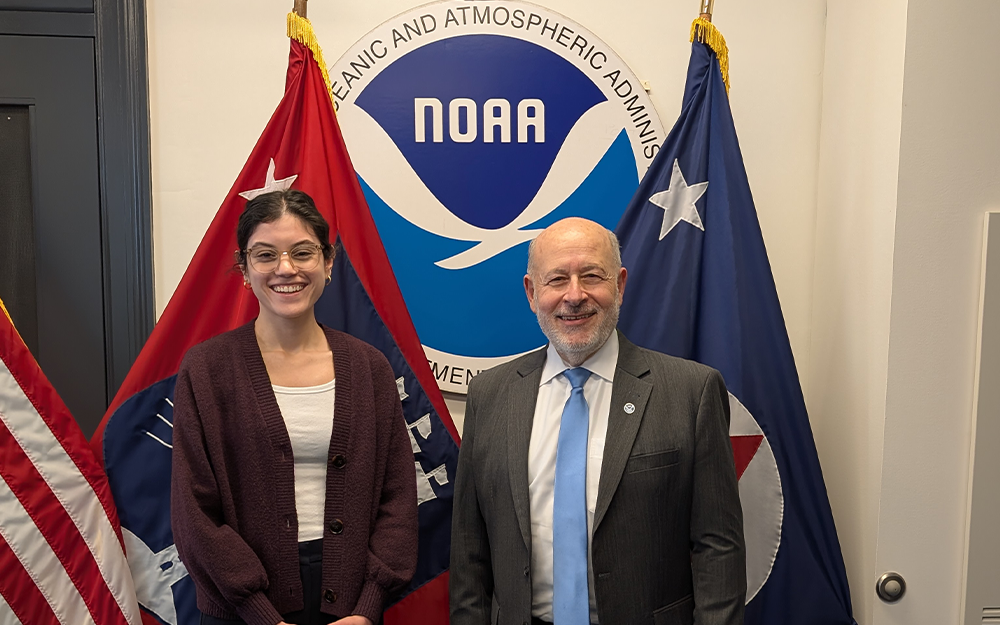 Kacey Clayton (left) with former NOAA Administrator, Dr. Rick Spinrad (right). Photo courtesy of Kacey Clayton.