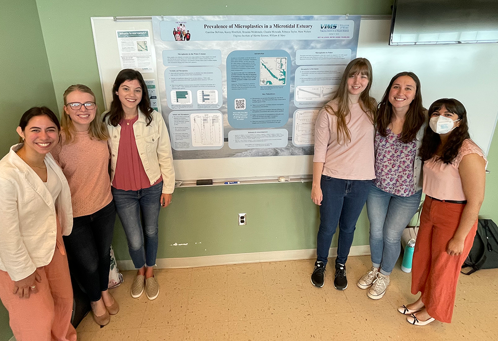 Moncada-Wireman (far-right) and her peers presenting their graduate research at the Batten School & VIMS.