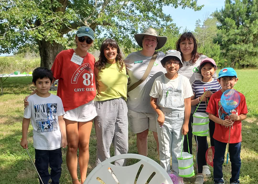 Moncada-Wireman (third from the left) at the 2024 Nature Conservancy’s VCR bilingual picnic.