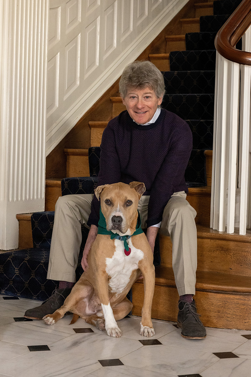 William &amp; Mary alumnus and philanthropist Dr. R. Todd Stravitz at home with his dog, Raylan. Photo by Alfred Herczeg