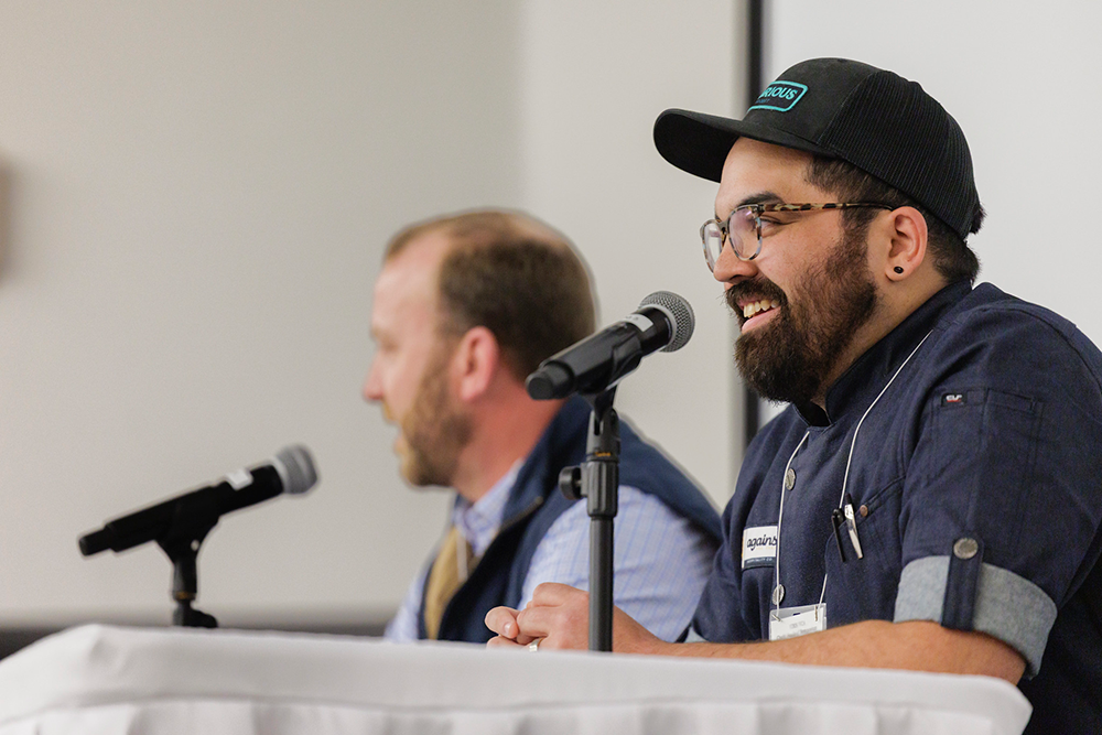 The event concluded with a Q&amp;A panel featuring chef and restaurateur Andrew Voss (left) and chef Simon Elaban (right). Photo credit: Lathan Goumas | Virginia Sea Grant