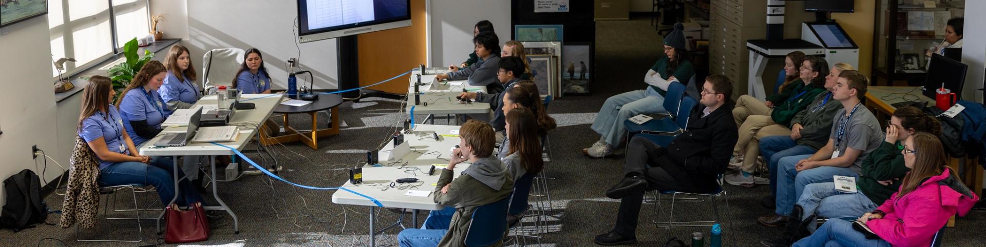 A Blue Crab Bowl match between Chesapeake Bay Governor's School, Glenns and Catholic High School in the Hargis Library at Batten School &amp; VIMS. Photo by Bayleigh Albert for Virginia Sea Grant.