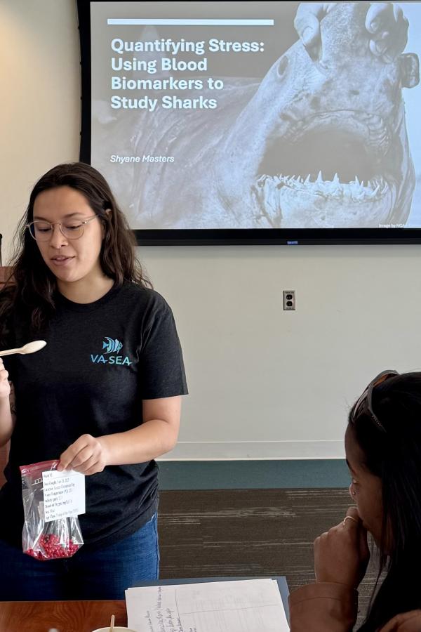 Batten School &amp; VIMS graduate student Shyane Masters instructs teachers on lesson plan design. Photo by Patrick McGettigan.